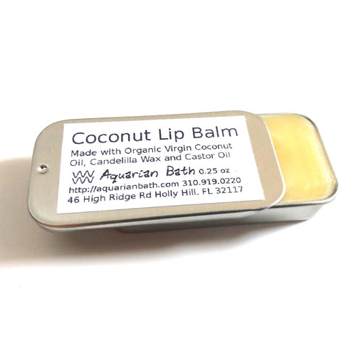 Coconut lip balm in 0.25 oz slide tin by Aquarian Bath